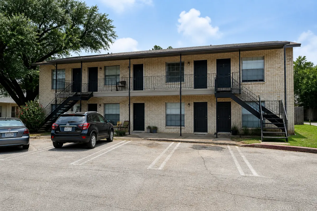 South Austin tan-brick two-story fourplex multifamily rental