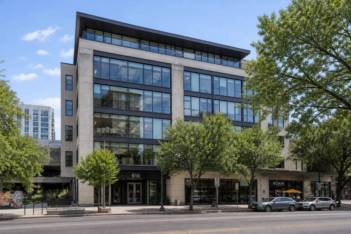 Downtown Austin Class-A glass office building with ground-floor retail